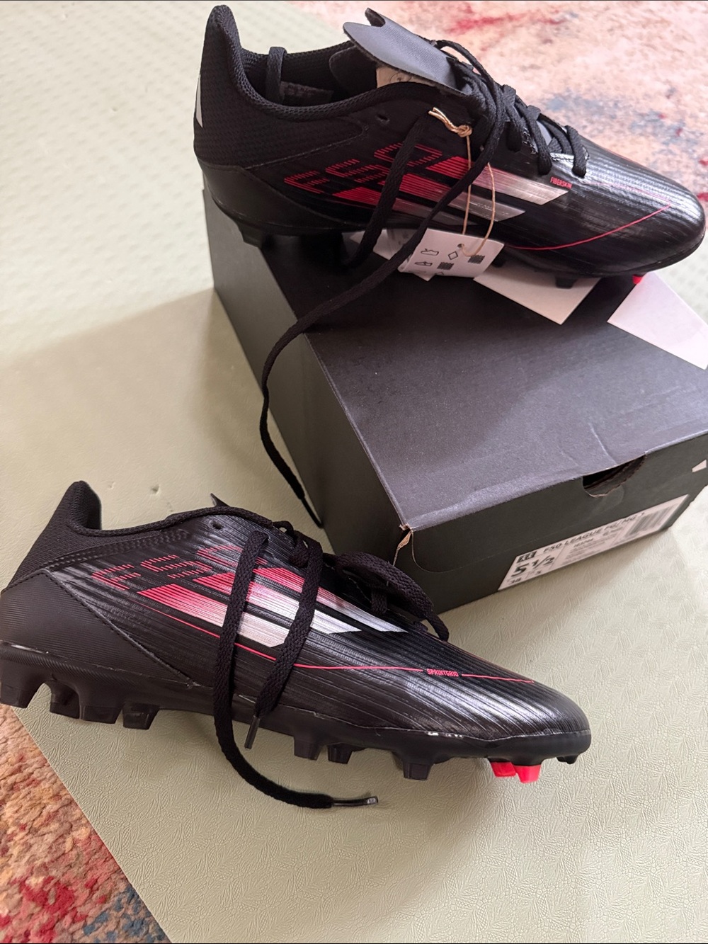 Men's Black Athletic Soccer Cleats with Red Accents